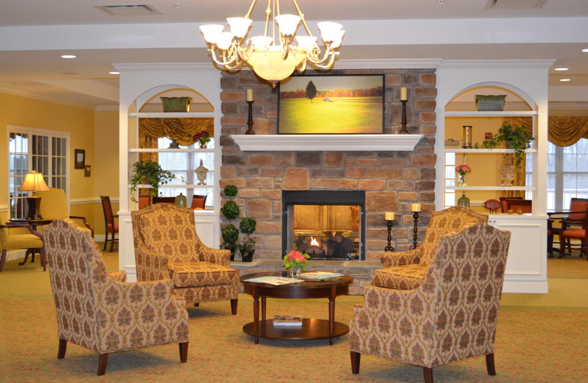 Fireplace Front a living room with a fireplace and chairs